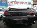 2003 Black Pontiac Grand Am GT Sedan  photo #3