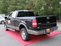 2005 Black Ford F150 Lariat SuperCab 4x4  photo #6