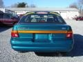 1995 Cayman Teal Metallic Ford Escort LX Sedan  photo #6