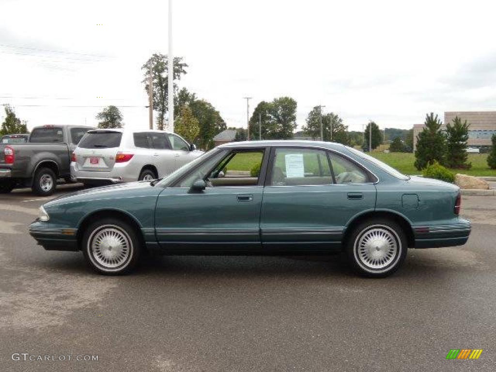 1997 Regency Sedan - Medium Dark Teal Metallic / Light Beige photo #2