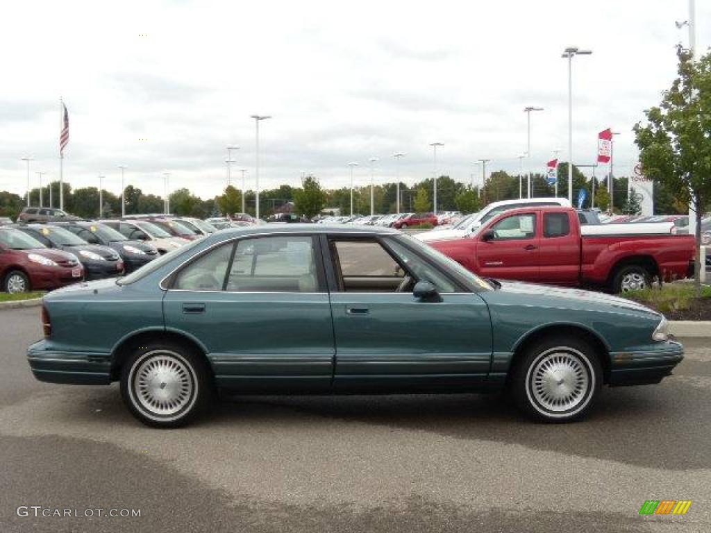 1997 Regency Sedan - Medium Dark Teal Metallic / Light Beige photo #6