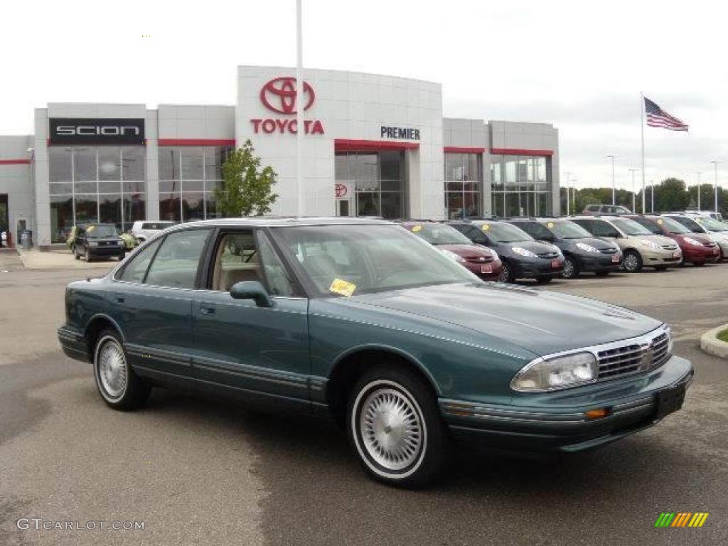 1997 Regency Sedan - Medium Dark Teal Metallic / Light Beige photo #7