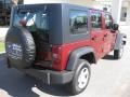 2010 Red Rock Crystal Pearl Jeep Wrangler Unlimited Sport 4x4  photo #5