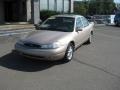 1999 Light Prairie Tan Metallic Ford Contour SE  photo #3