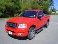 2005 Bright Red Ford F150 STX Regular Cab  photo #1