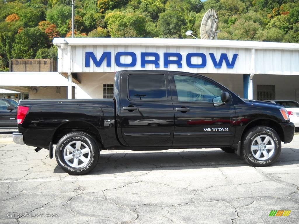 2009 Titan SE Crew Cab 4x4 - Galaxy Black / Charcoal photo #1