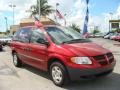 2003 Inferno Red Tinted Pearl Dodge Caravan SE  photo #1