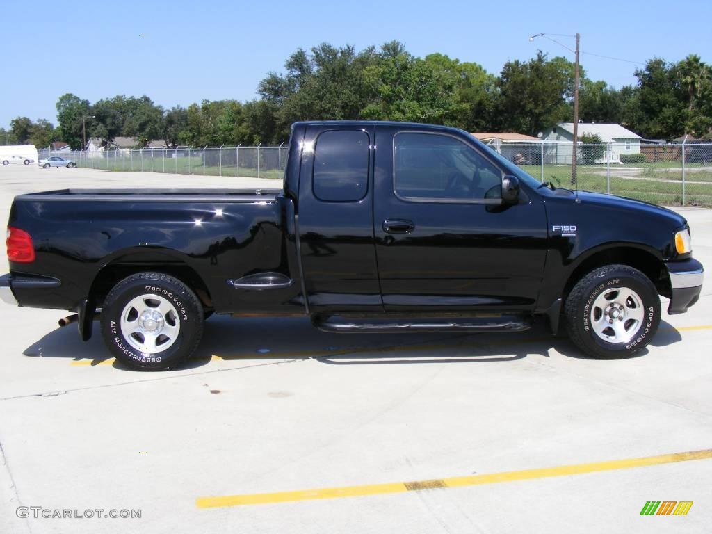 2002 F150 XLT SuperCab - Black / Dark Graphite photo #2