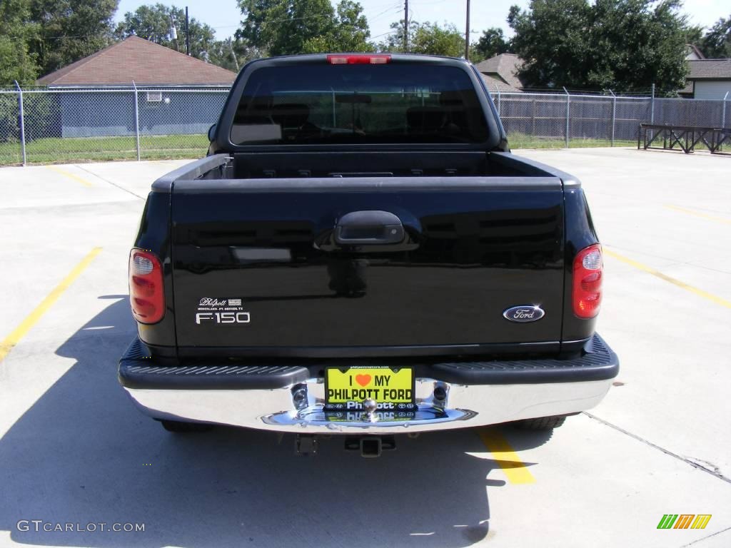 2002 F150 XLT SuperCab - Black / Dark Graphite photo #4