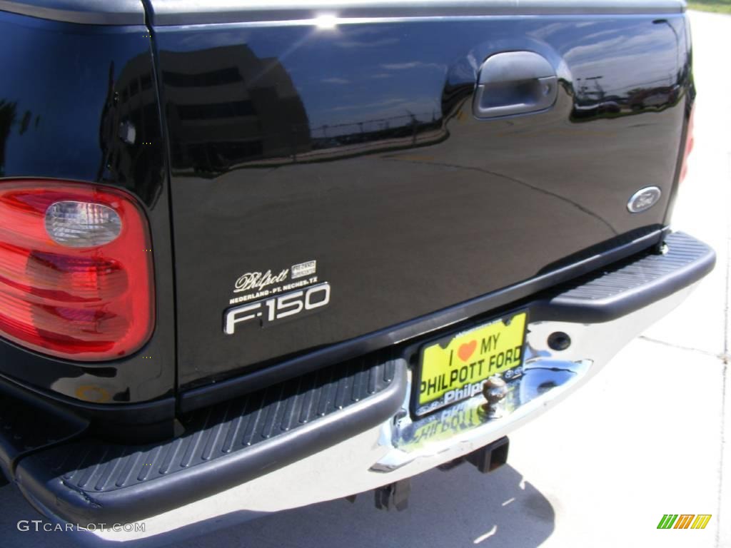 2002 F150 XLT SuperCab - Black / Dark Graphite photo #24