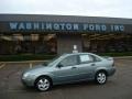 2005 Light Tundra Metallic Ford Focus ZX4 SES Sedan  photo #1