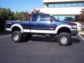 2002 True Blue Metallic Ford F150 XLT SuperCab 4x4  photo #5