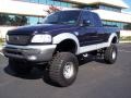 2002 True Blue Metallic Ford F150 XLT SuperCab 4x4  photo #11