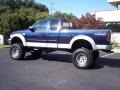 2002 True Blue Metallic Ford F150 XLT SuperCab 4x4  photo #15