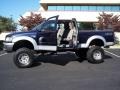 2002 True Blue Metallic Ford F150 XLT SuperCab 4x4  photo #26