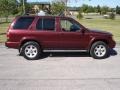 2004 Merlot Red Pearl Nissan Pathfinder LE Platinum 4x4  photo #2