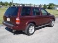 2004 Merlot Red Pearl Nissan Pathfinder LE Platinum 4x4  photo #3