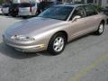 Mocha Metallic 1995 Oldsmobile Aurora 4.0