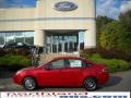 2010 Sangria Red Metallic Ford Focus SE Sedan  photo #1