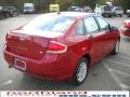 2010 Sangria Red Metallic Ford Focus SE Sedan  photo #6