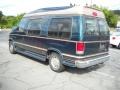 Green/Light Saddle Metallic - E Series Van E150 Conversion Van Photo No. 4
