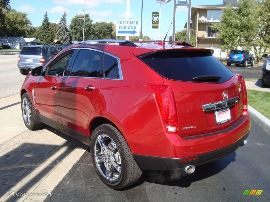 2010 SRX 4 V6 AWD - Crystal Red Tintcoat / Titanium/Ebony photo #6