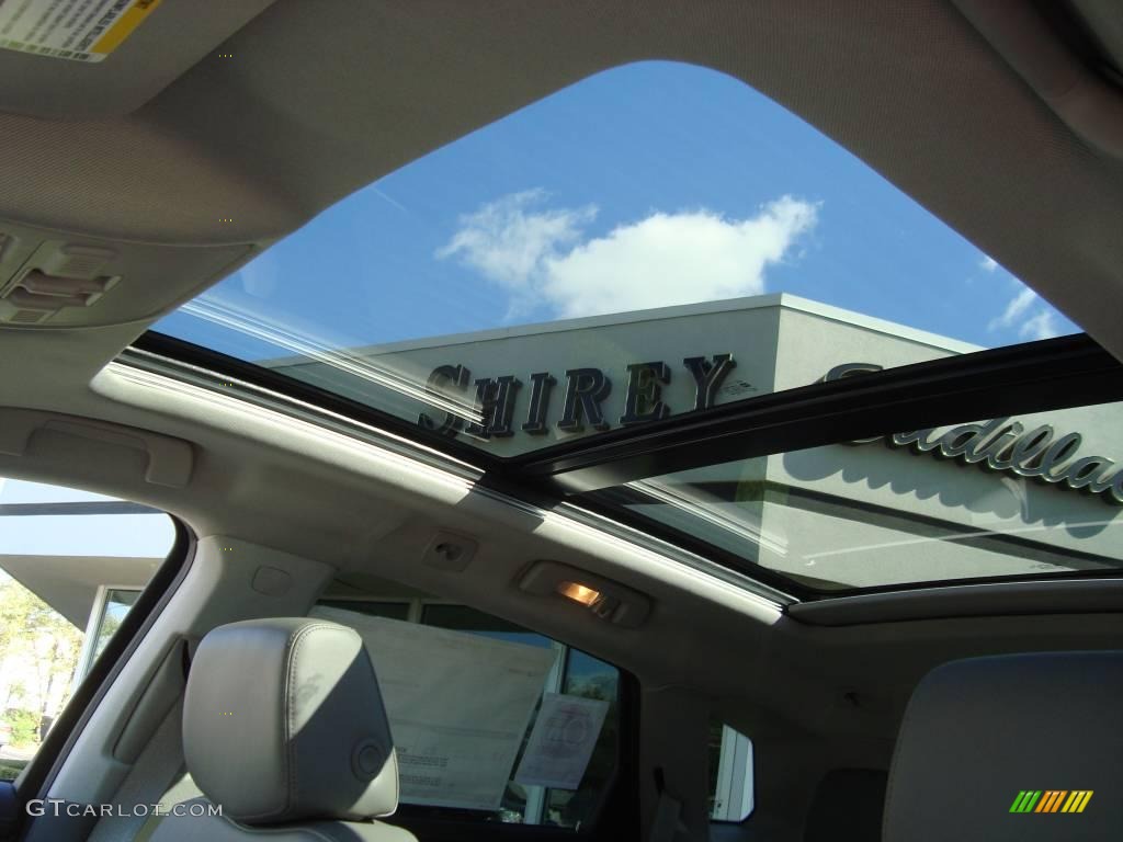 2010 SRX 4 V6 AWD - Crystal Red Tintcoat / Titanium/Ebony photo #12