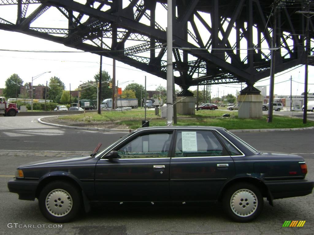 1990 Camry Deluxe Sedan - Dark Blue Pearl Metallic / Gray photo #1
