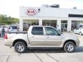 2004 Pueblo Gold Metallic Ford Explorer Sport Trac XLT 4x4  photo #2