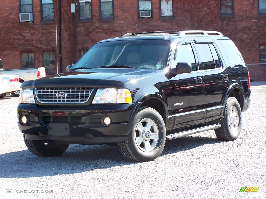 2002 Explorer Limited 4x4 - Black Clearcoat / Medium Parchment photo #1