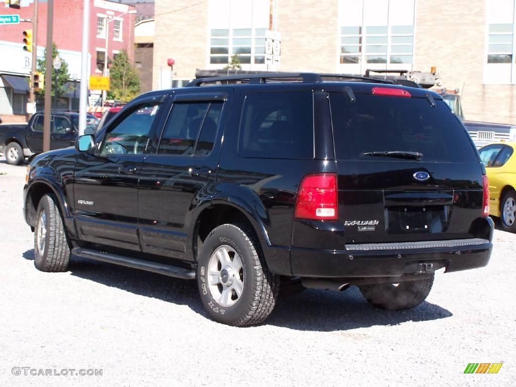 2002 Explorer Limited 4x4 - Black Clearcoat / Medium Parchment photo #2