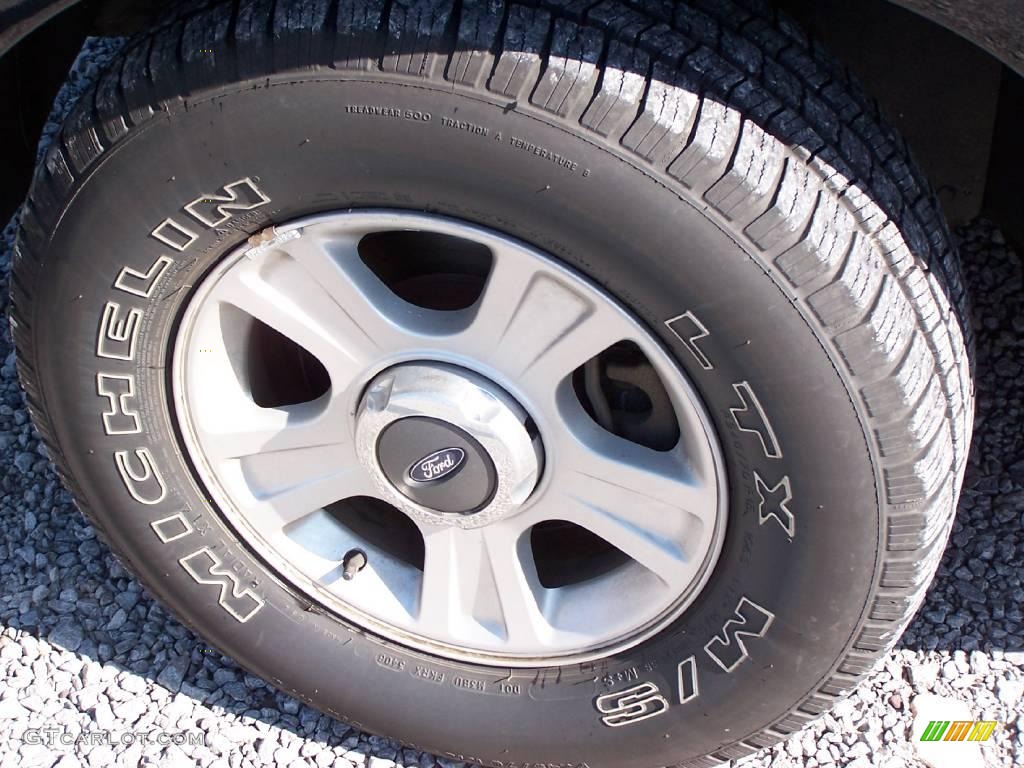 2002 Explorer Limited 4x4 - Black Clearcoat / Medium Parchment photo #6