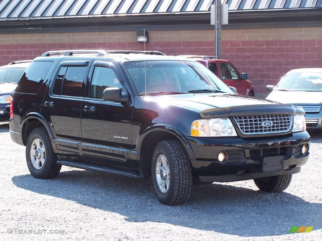 2002 Explorer Limited 4x4 - Black Clearcoat / Medium Parchment photo #12