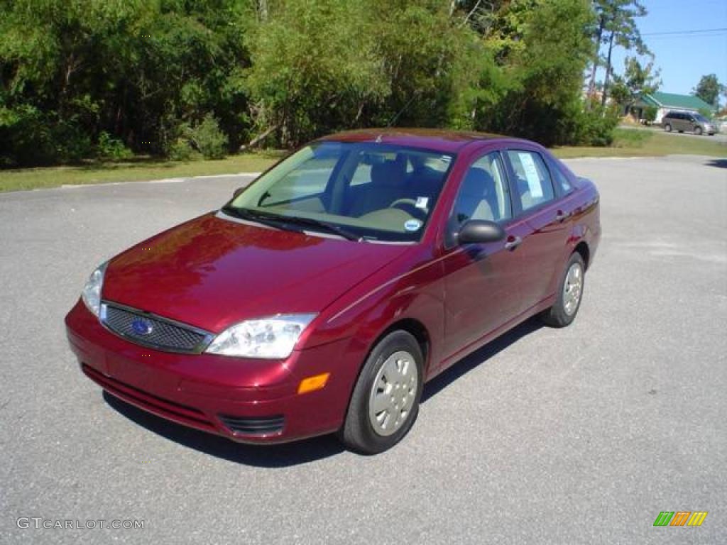 2006 Focus ZX4 S Sedan - Dark Toreador Red Metallic / Dark Pebble/Light Pebble photo #1