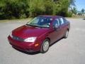 2006 Dark Toreador Red Metallic Ford Focus ZX4 S Sedan  photo #1