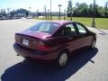 2006 Dark Toreador Red Metallic Ford Focus ZX4 S Sedan  photo #5