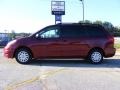 2009 Salsa Red Pearl Toyota Sienna LE  photo #1