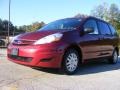 2009 Salsa Red Pearl Toyota Sienna LE  photo #2