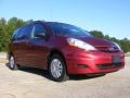 2009 Salsa Red Pearl Toyota Sienna LE  photo #4