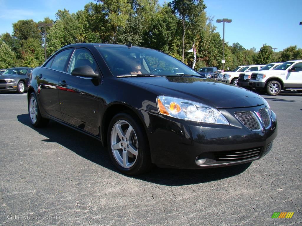 2009 G6 GT Sedan - Carbon Black Metallic / Ebony photo #1