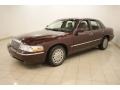 B4 - Chestnut Metallic Mercury Grand Marquis (2003)