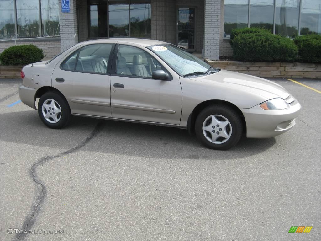 2004 Cavalier Sedan - Sandrift Metallic / Neutral photo #1