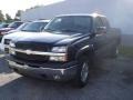 2005 Black Chevrolet Silverado 1500 Z71 Extended Cab 4x4  photo #1