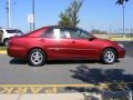 2003 Salsa Red Pearl Toyota Camry LE  photo #16