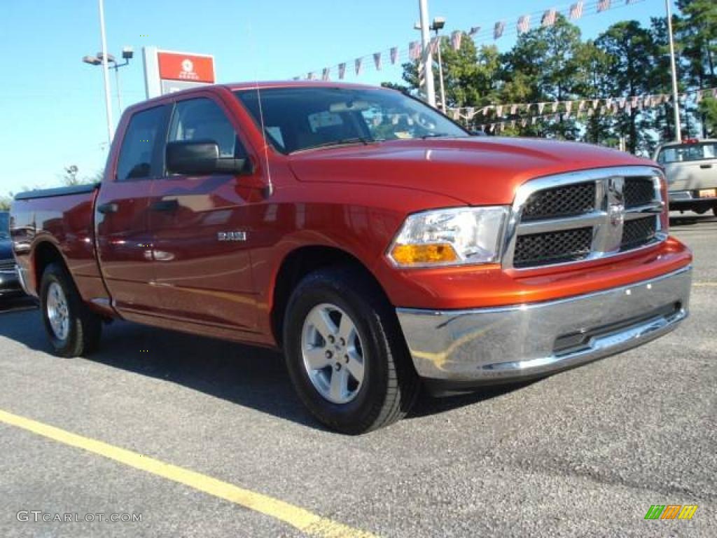 2009 Ram 1500 SLT Quad Cab - Sunburst Orange Pearl / Light Pebble Beige/Bark Brown photo #6