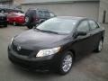 2009 Black Sand Pearl Toyota Corolla LE  photo #1