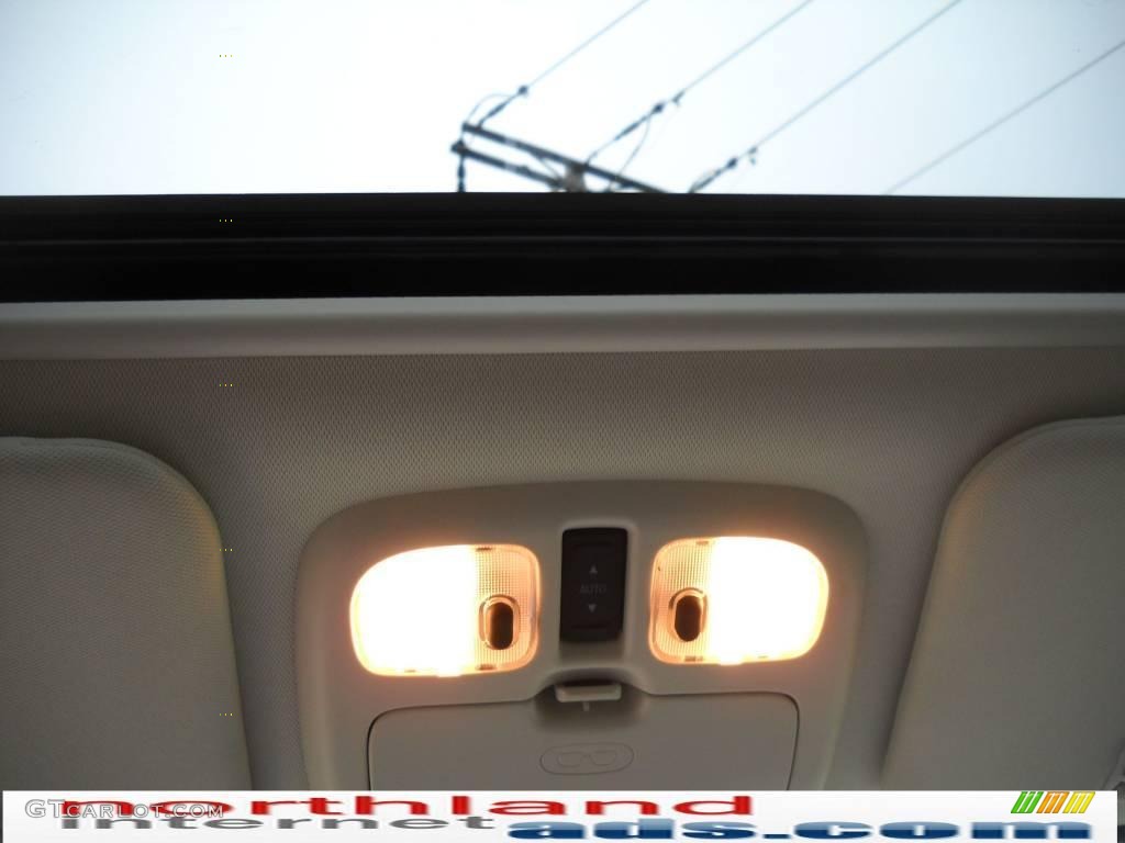 2010 Mariner Hybrid 4WD - Steel Blue Metallic / Stone photo #16