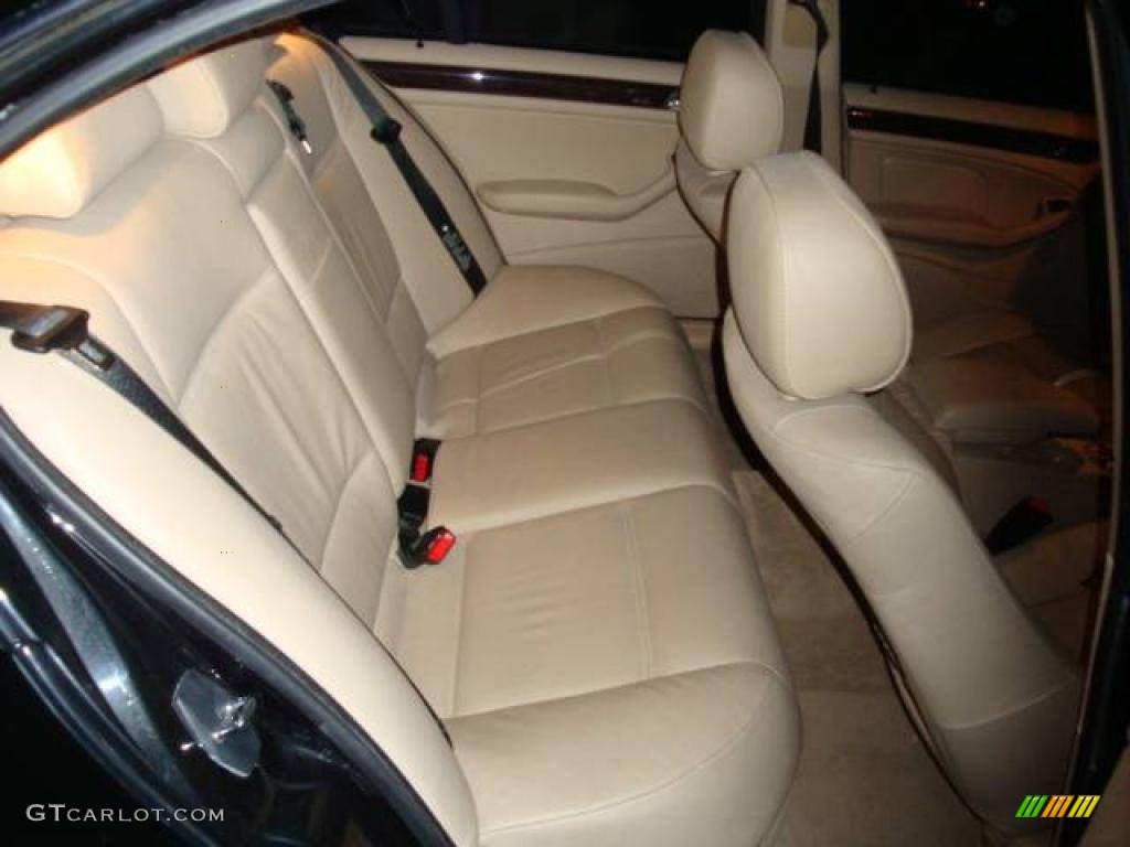 2004 3 Series 330i Sedan - Black Sapphire Metallic / Sand photo #16
