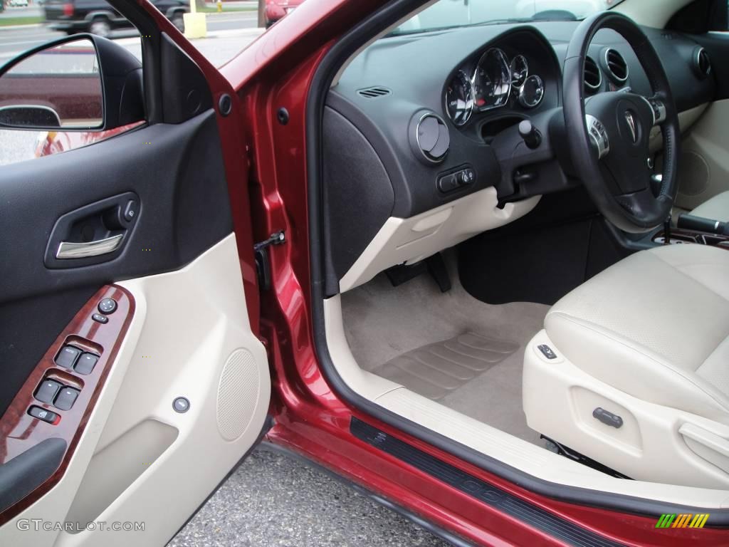 2009 G6 GT Sedan - Performance Red Metallic / Light Taupe photo #10