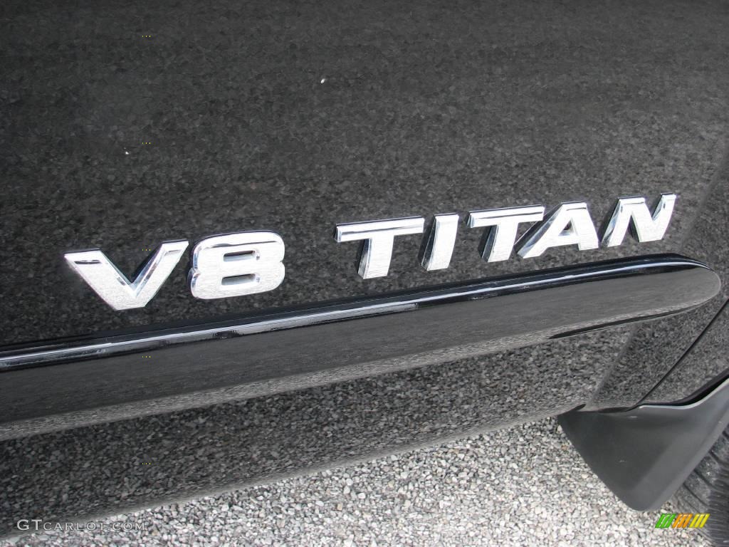 2007 Titan SE Crew Cab 4x4 - Galaxy Black / Graphite Black/Titanium photo #15